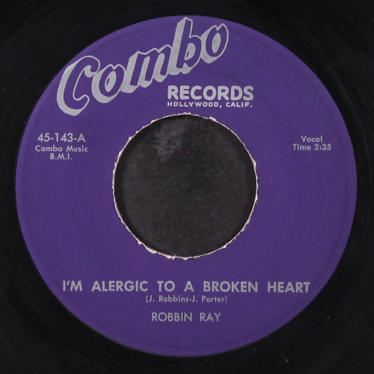 it's a lonesome old world / i'm alergic to a broken heart by ROBBIN RAY