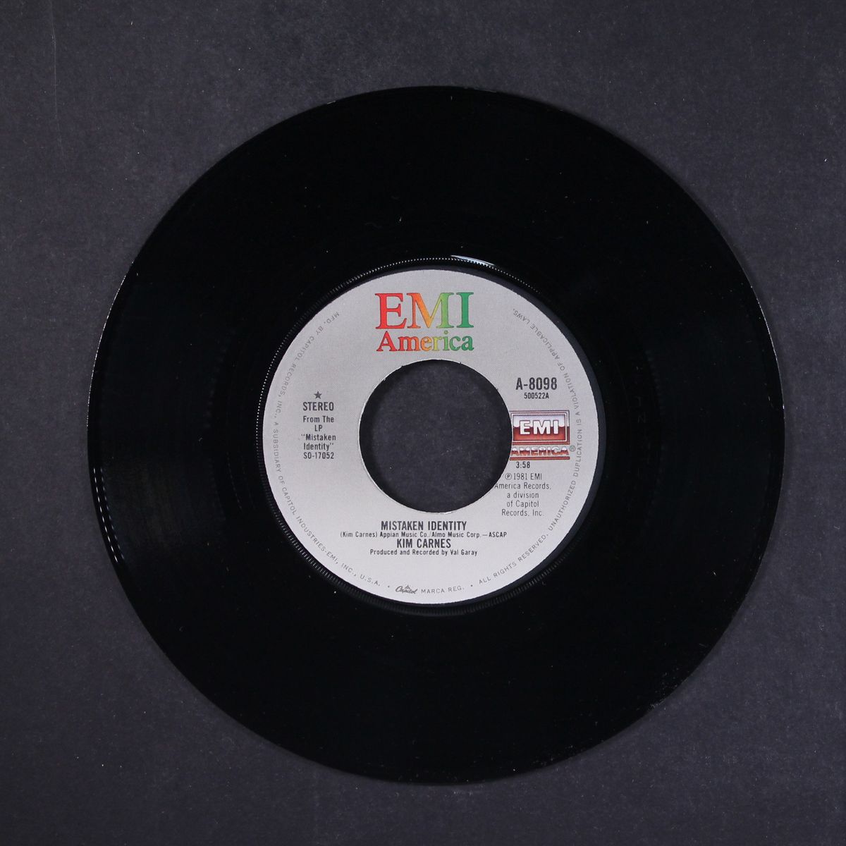 mistaken identity by KIM CARNES