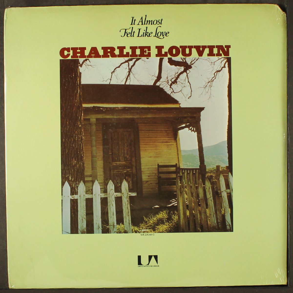 it almost felt like love by CHARLIE LOUVIN