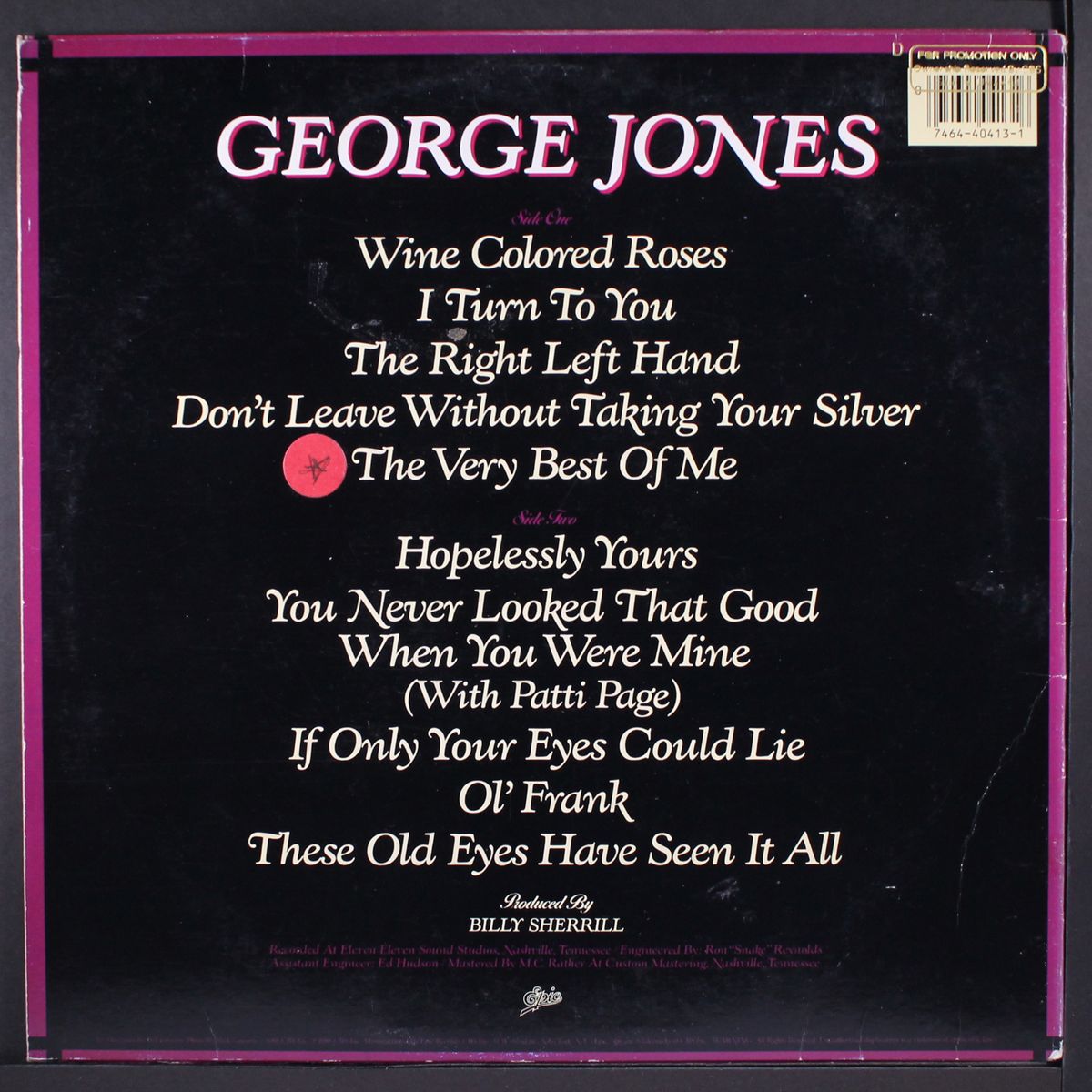 wine colored roses by GEORGE JONES