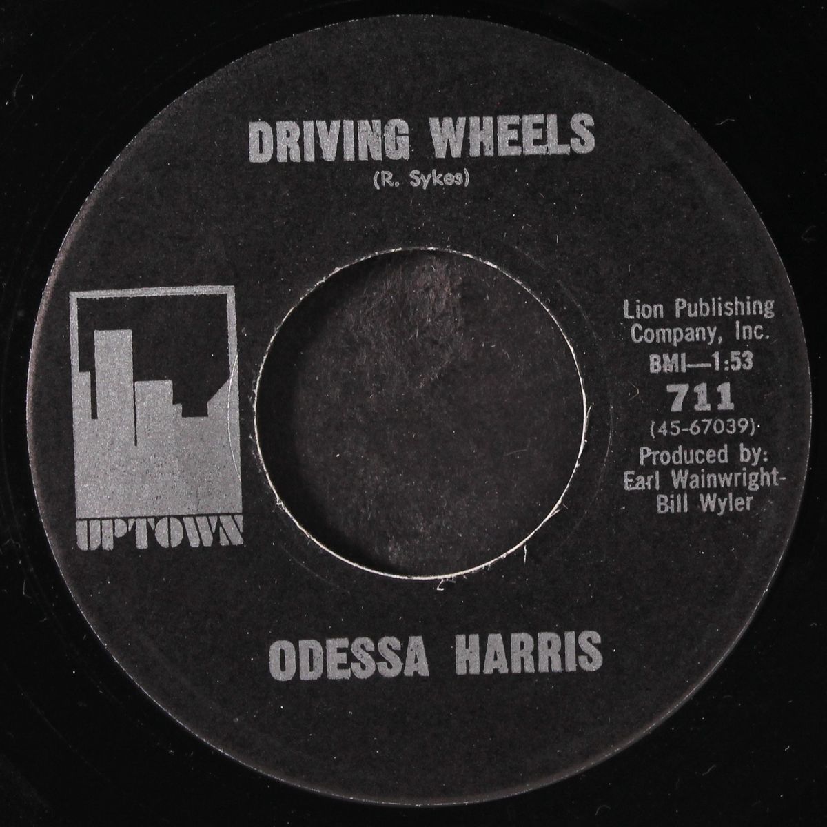driving wheels / the color of his love is blue by ODESSA HARRIS