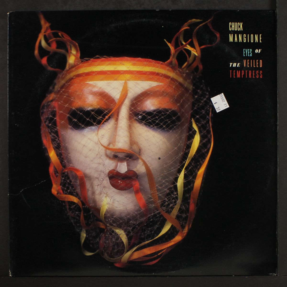 eyes of the veiled temptress by CHUCK MANGIONE