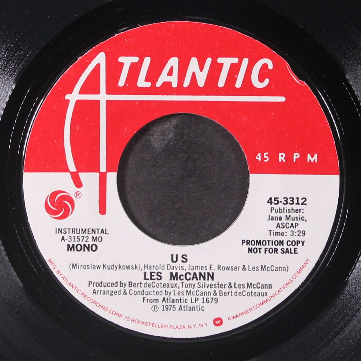 us / mono by LES MCCANN