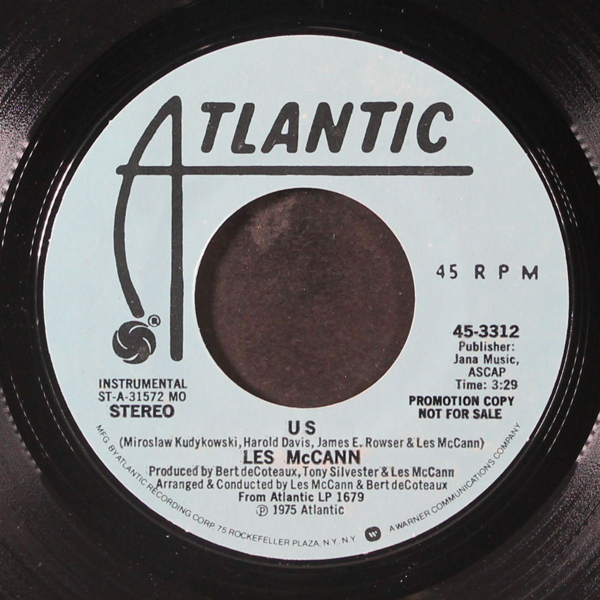 us / mono by LES MCCANN
