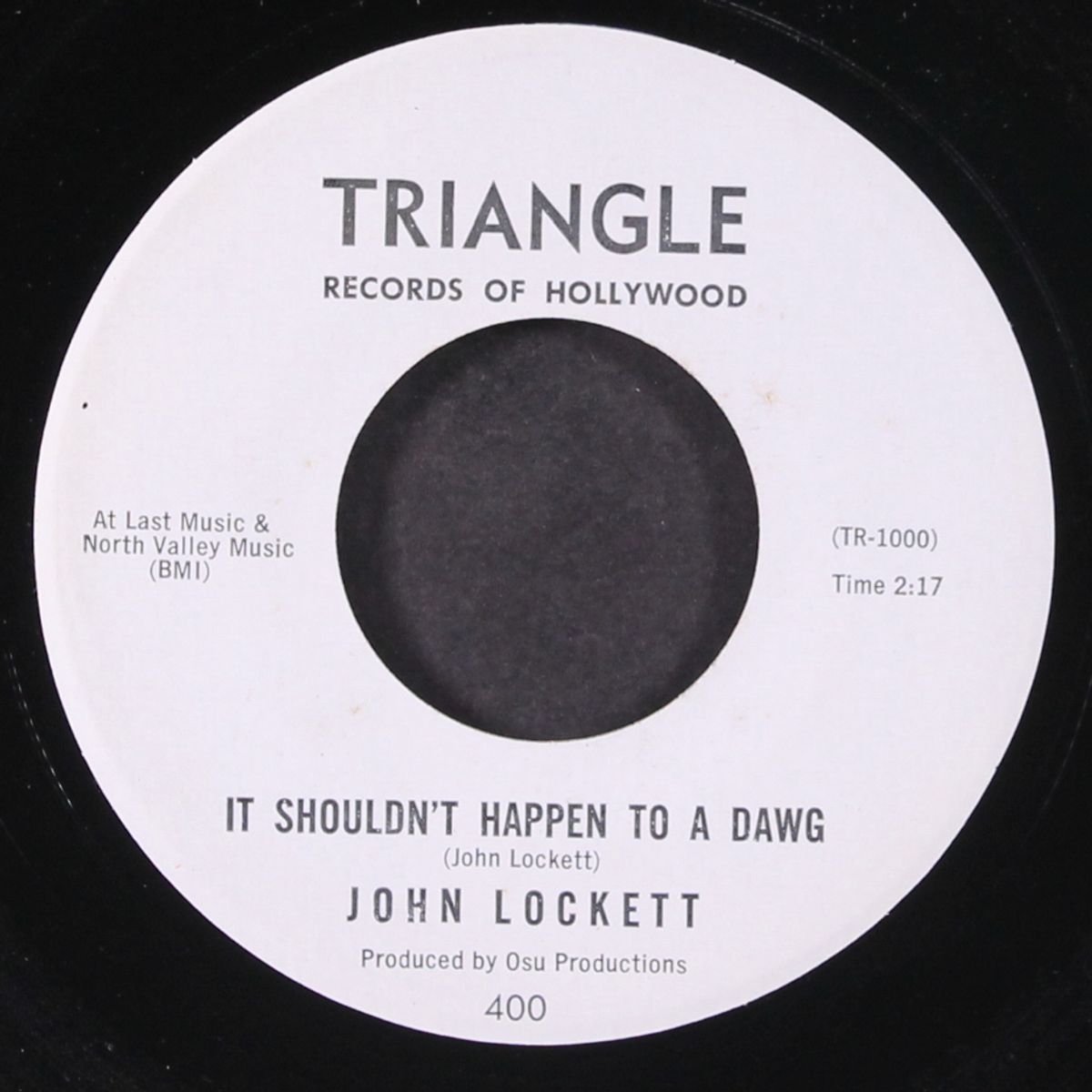 it shouldn't happen to a dawg / the circle twist by JOHN LOCKETT
