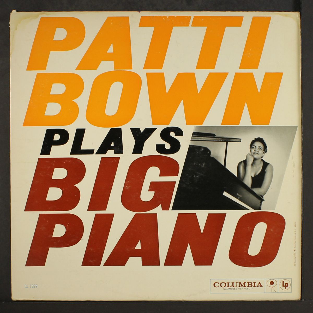 plays big piano by PATTI BOWN