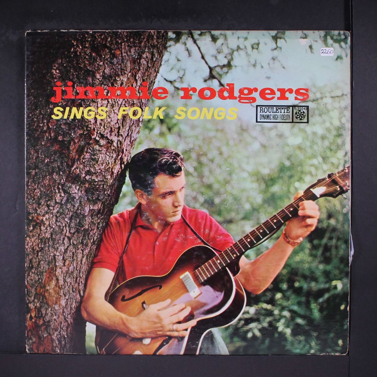 sings folk songs by JIMMIE RODGERS