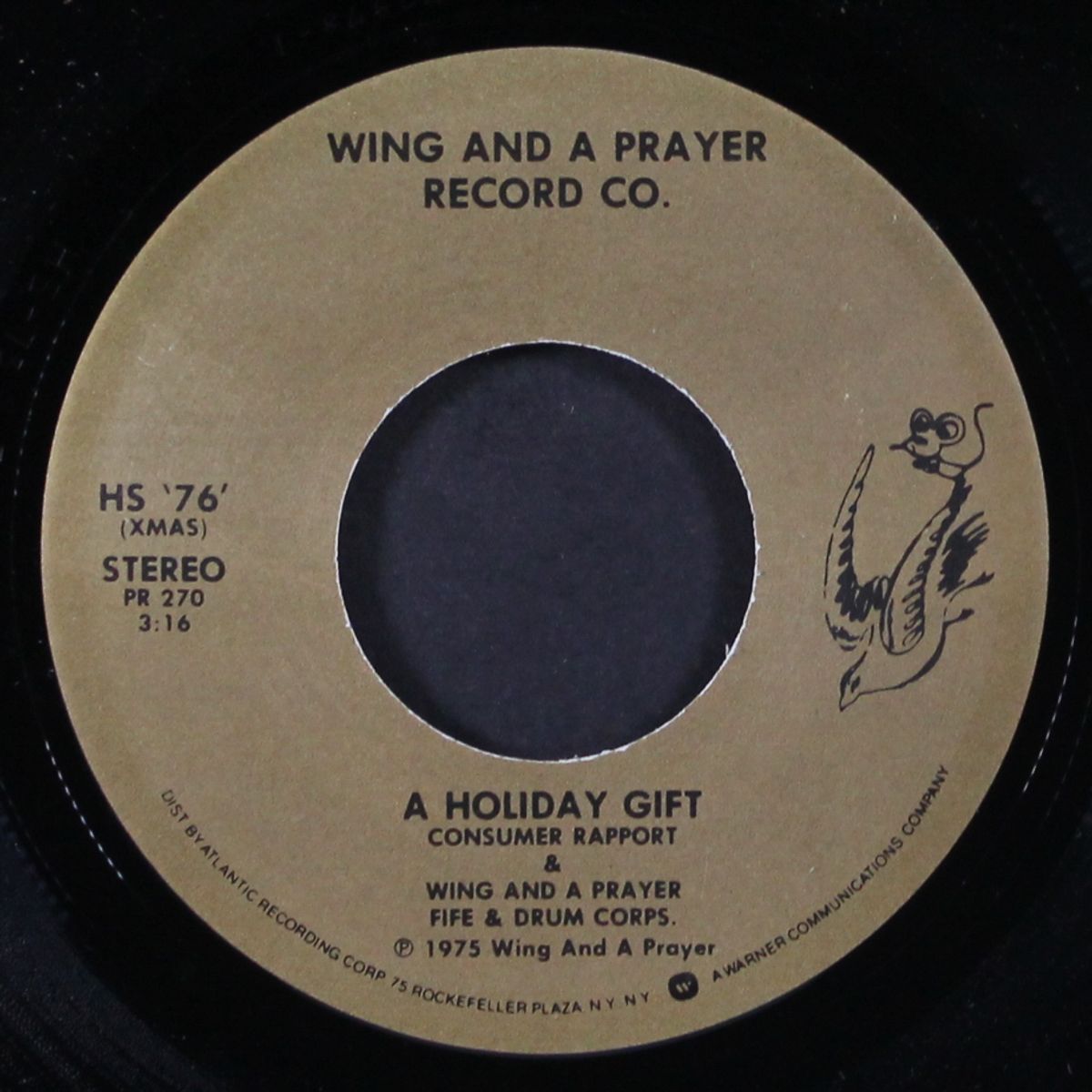 a holiday gift / same by CONSUMER RAPPORT & WING & A PRAYER FIFE