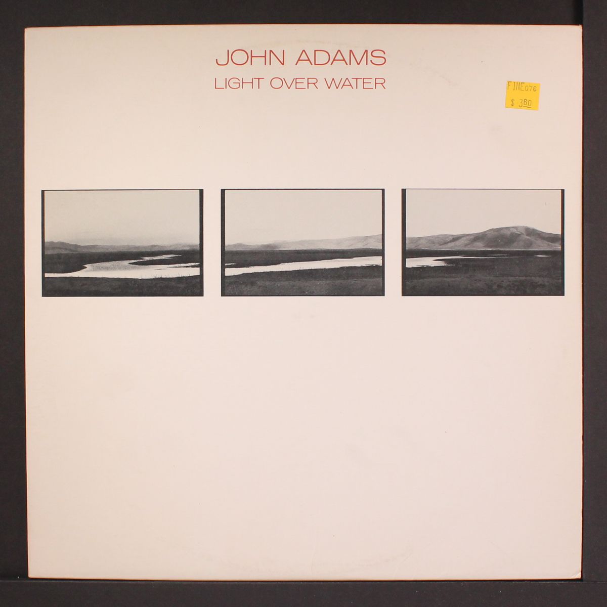 light over water by JOHN ADAMS