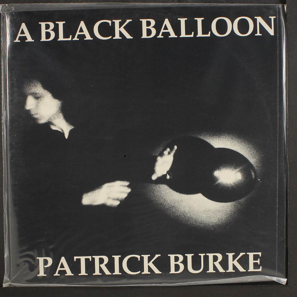 a black balloon by PATRICK BURKE