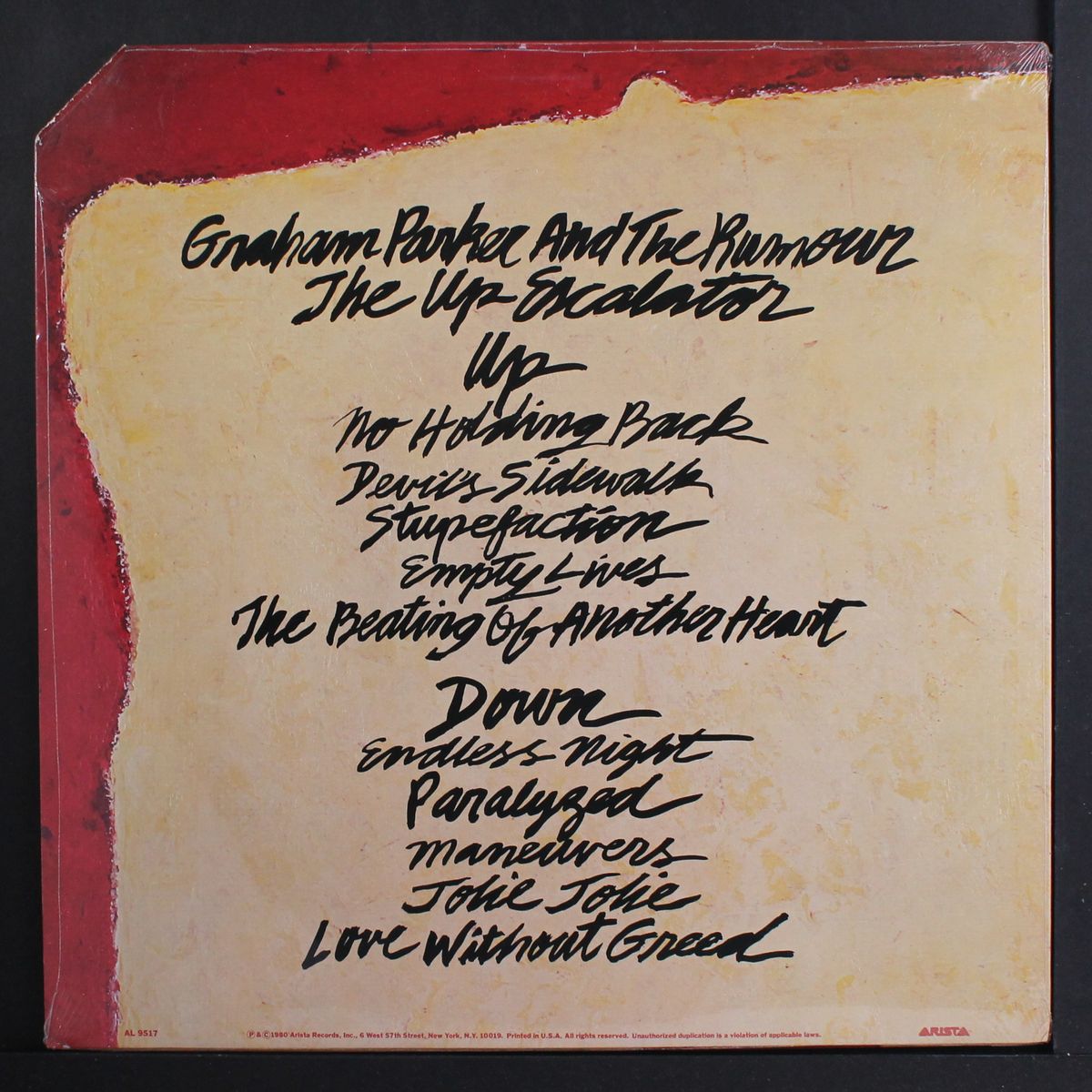 the up escalator by GRAHAM PARKER