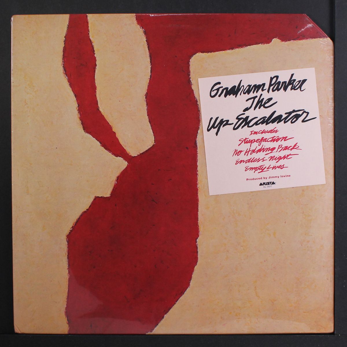 the up escalator by GRAHAM PARKER