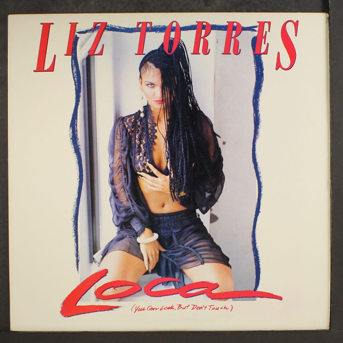 loca by LIZ TORRES