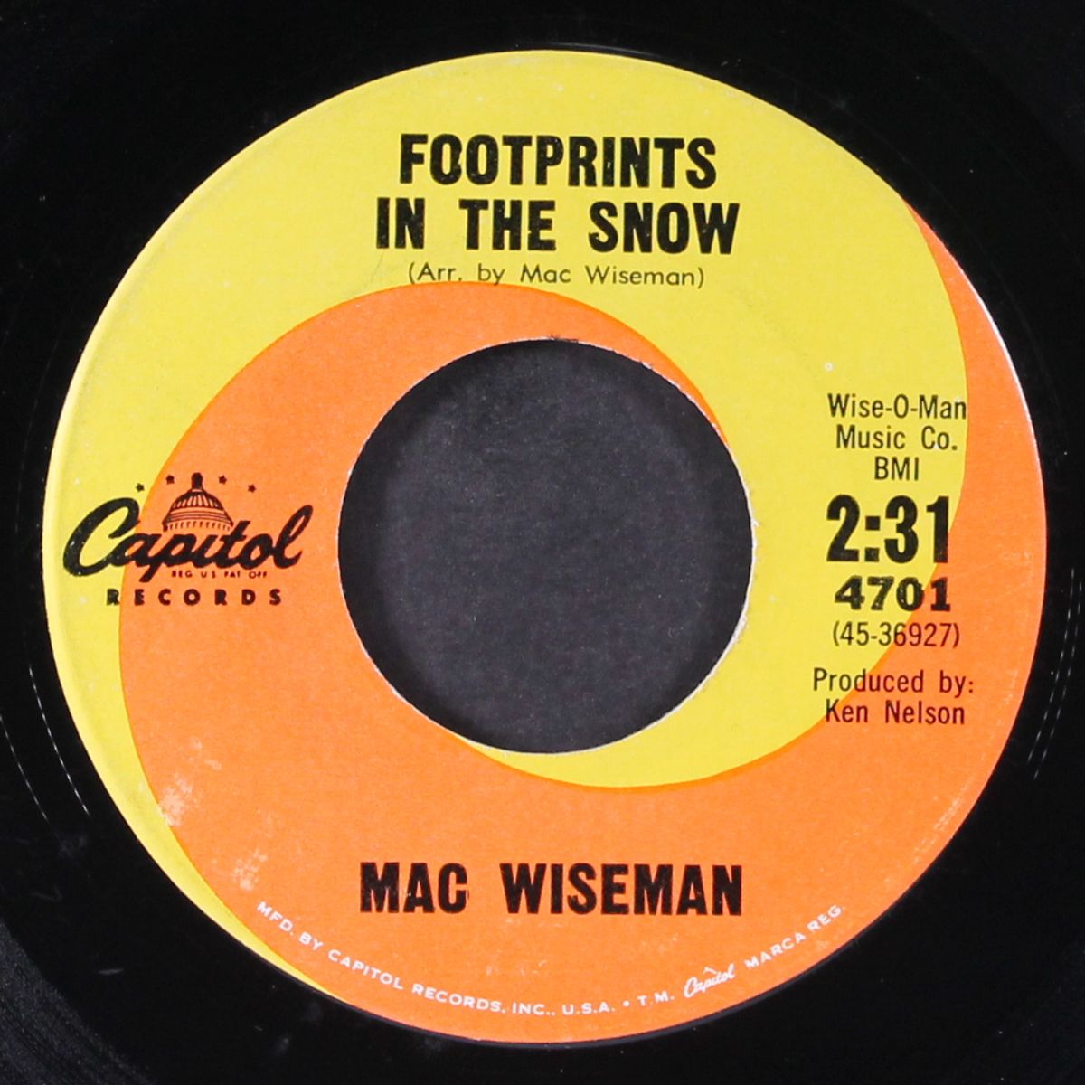footprints in the snow by MAC WISEMAN