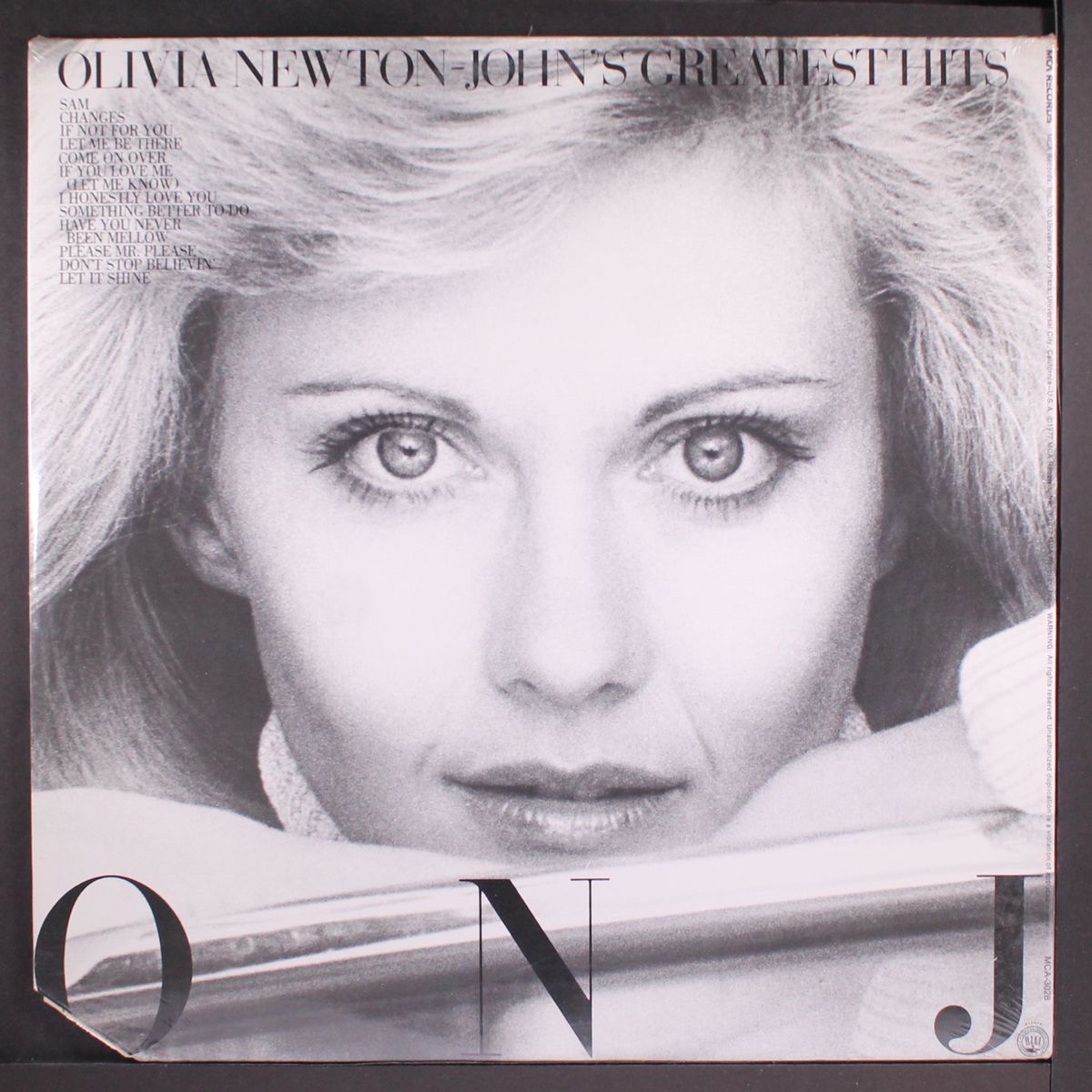 greatest hits by OLIVIA NEWTON-JOHN