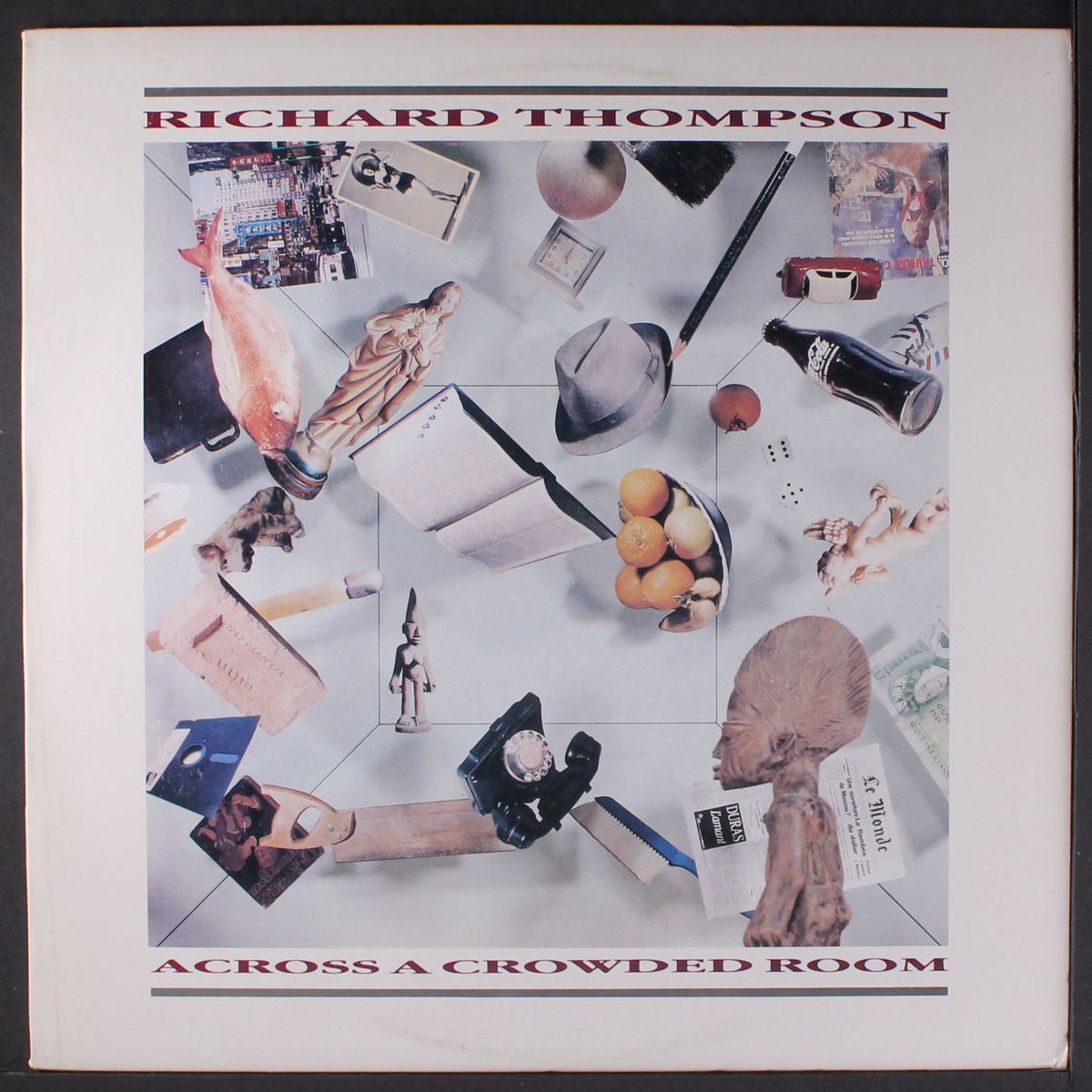 across a crowded room by RICHARD THOMPSON