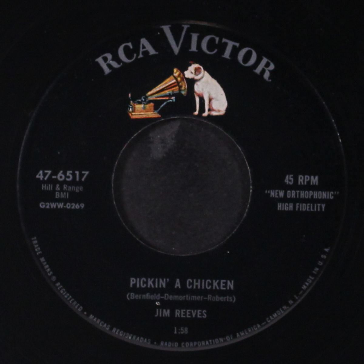 my lips are sealed / pickin' a chicken by JIM REEVES
