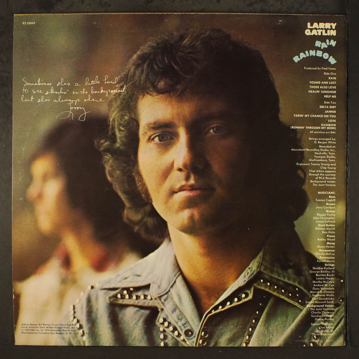 rain rainbow by LARRY GATLIN