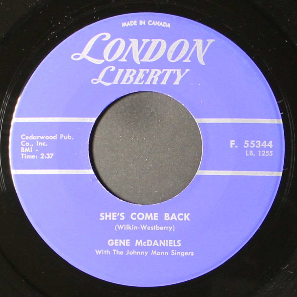 a tear / she's come back by GENE MCDANIELS