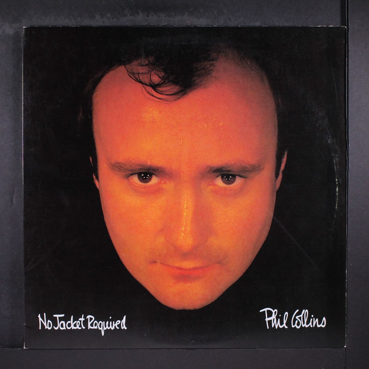 no jacket required by PHIL COLLINS