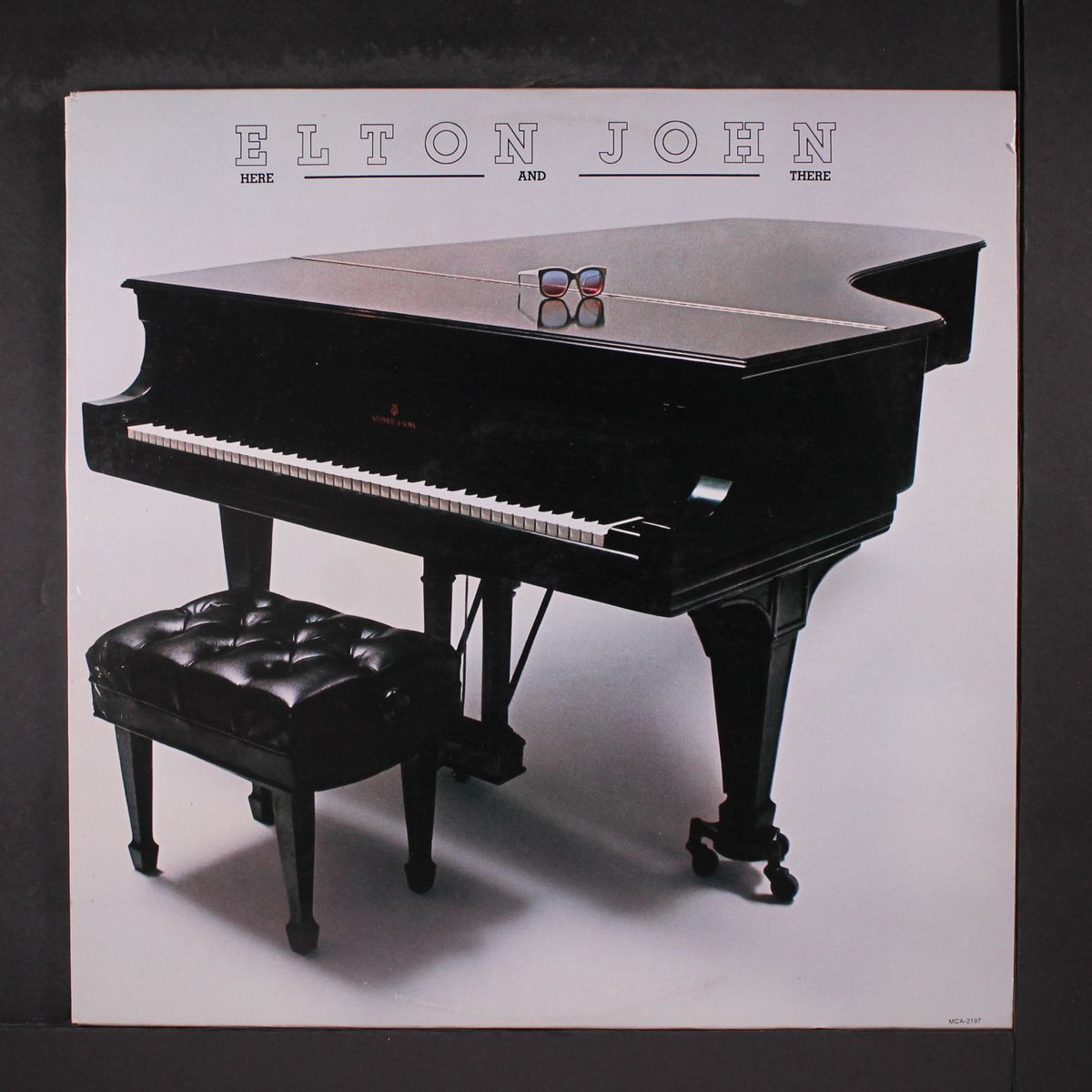 here and there by ELTON JOHN