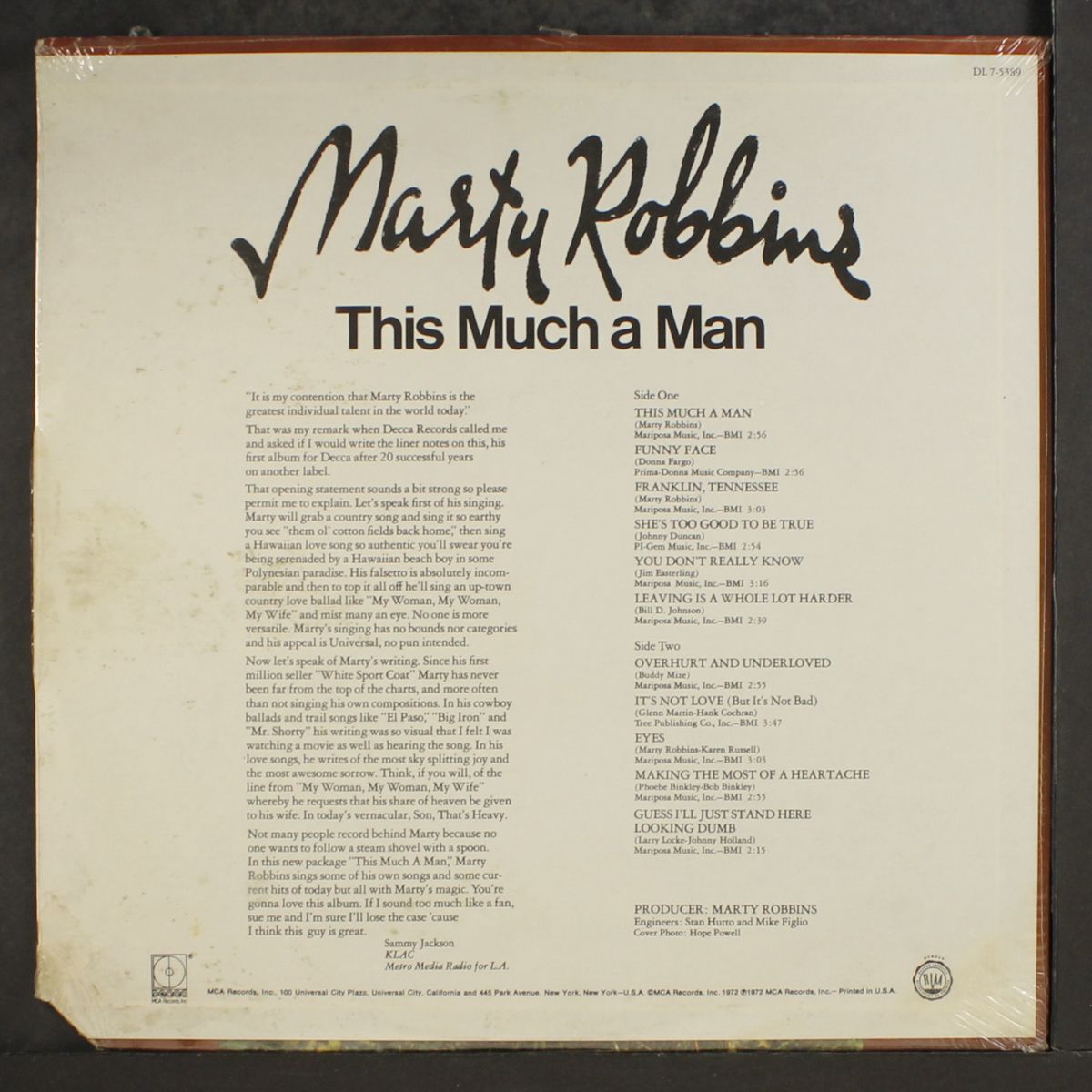 this much a man by MARTY ROBBINS