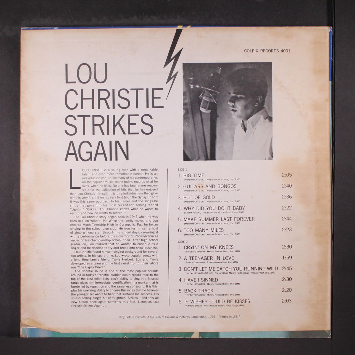 strikes again by LOU CHRISTIE