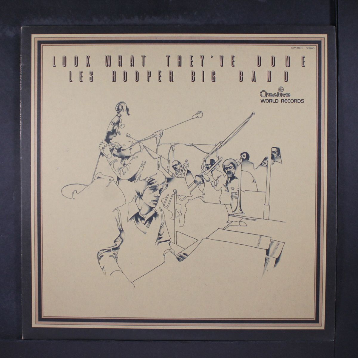 look what they've done by LES HOOPER BIG BAND