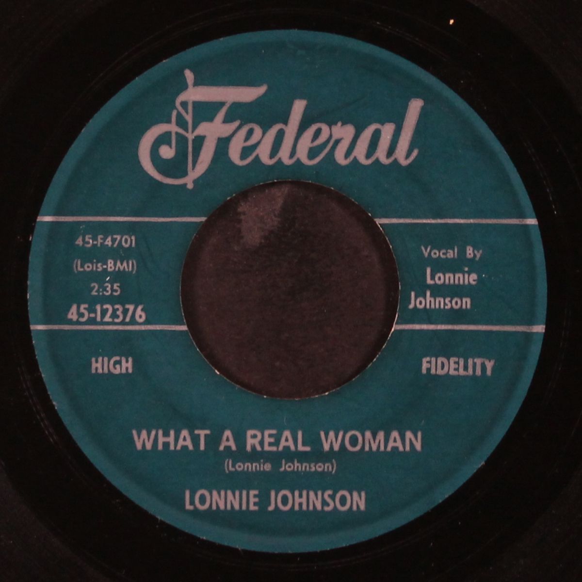 friendless blues / what a real woman by LONNIE JOHNSON