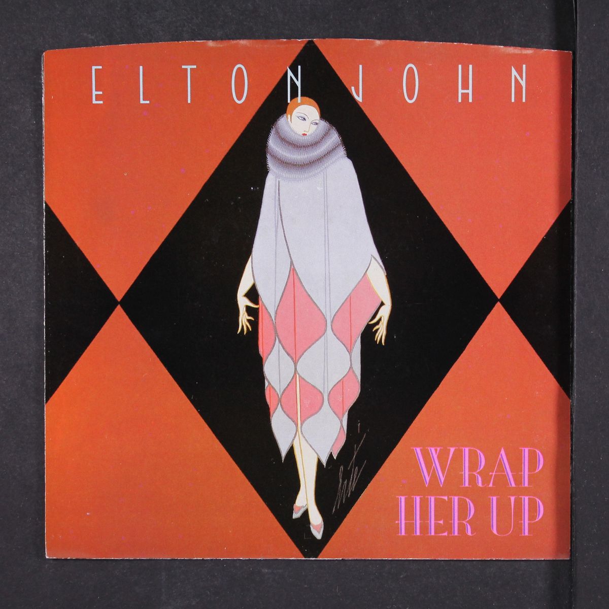 wrap her up / same by ELTON JOHN