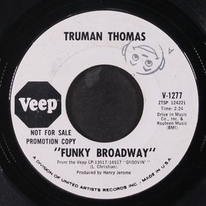 TRUMAN THOMAS