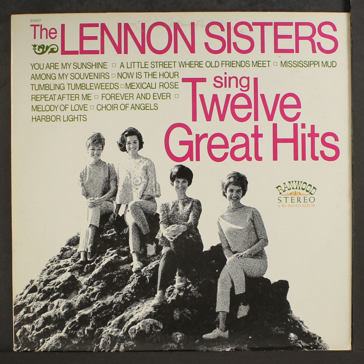 sing twelve great hits by LENNON SISTERS