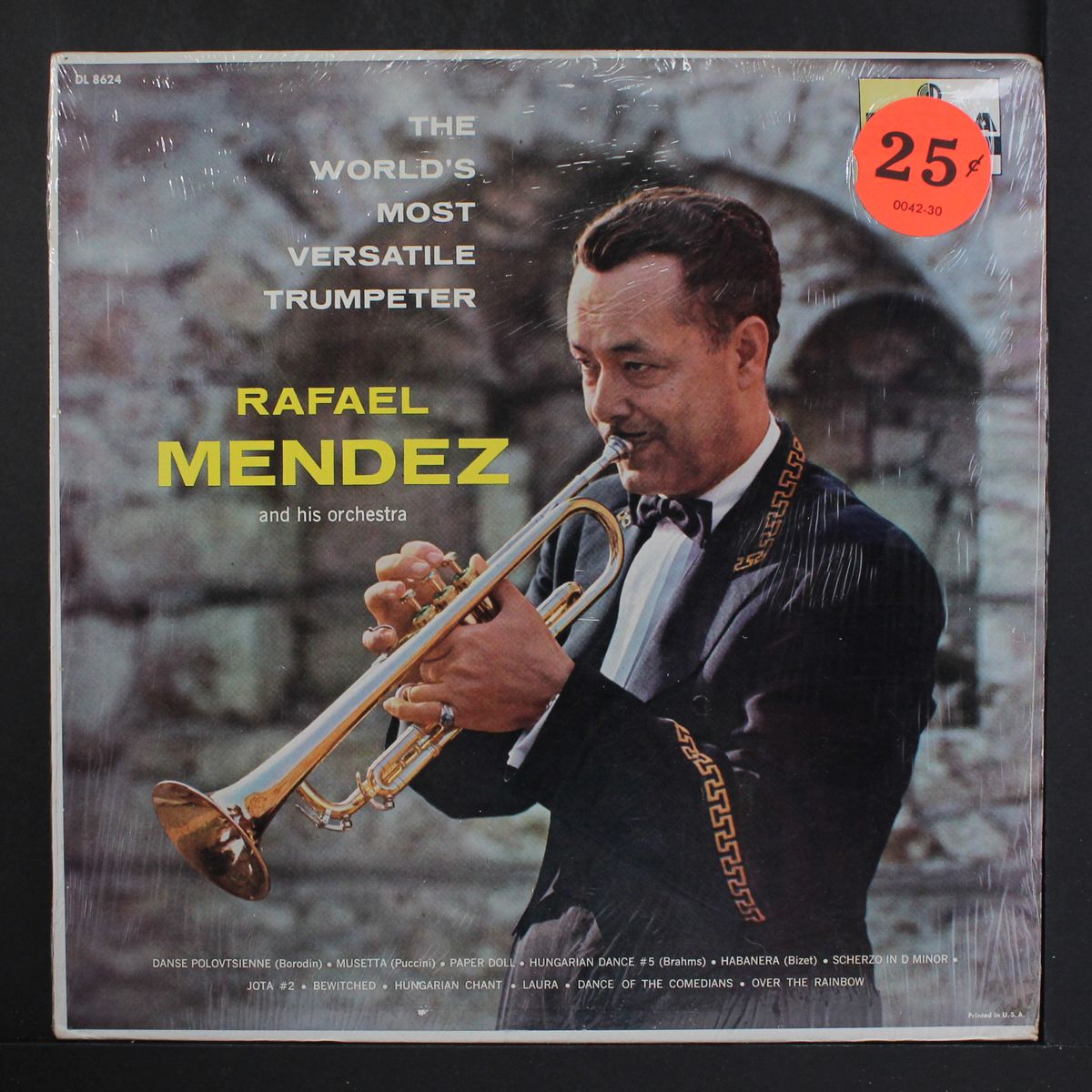 the world's most versatile trumpeter and his orchestra by RAFAEL MENDEZ