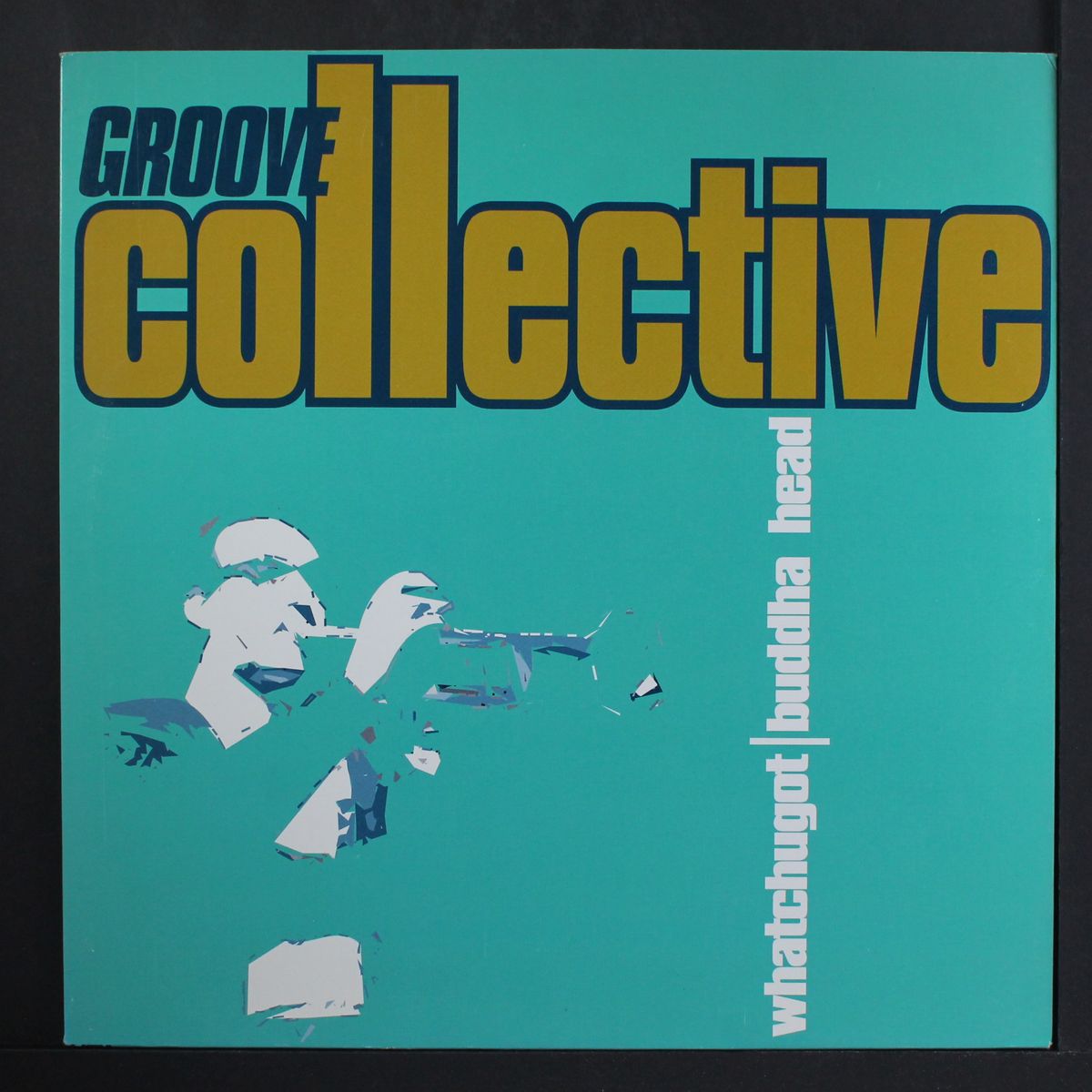 whatchugot / buddha head by GROOVE COLLECTIVE