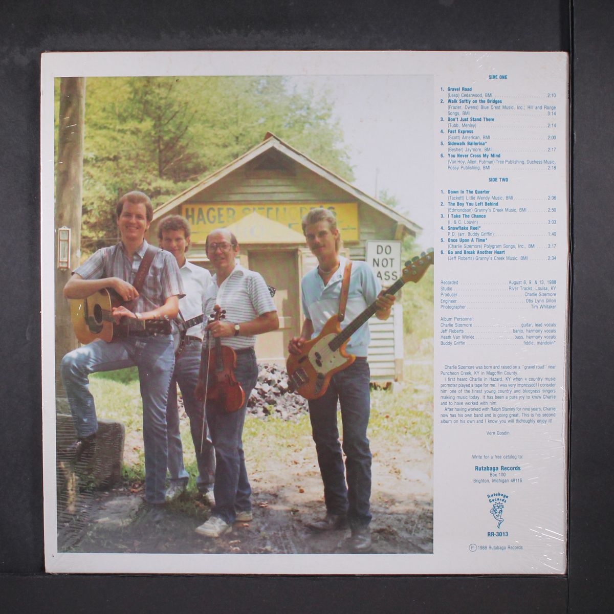 gravel road by CHARLIE SIZEMORE