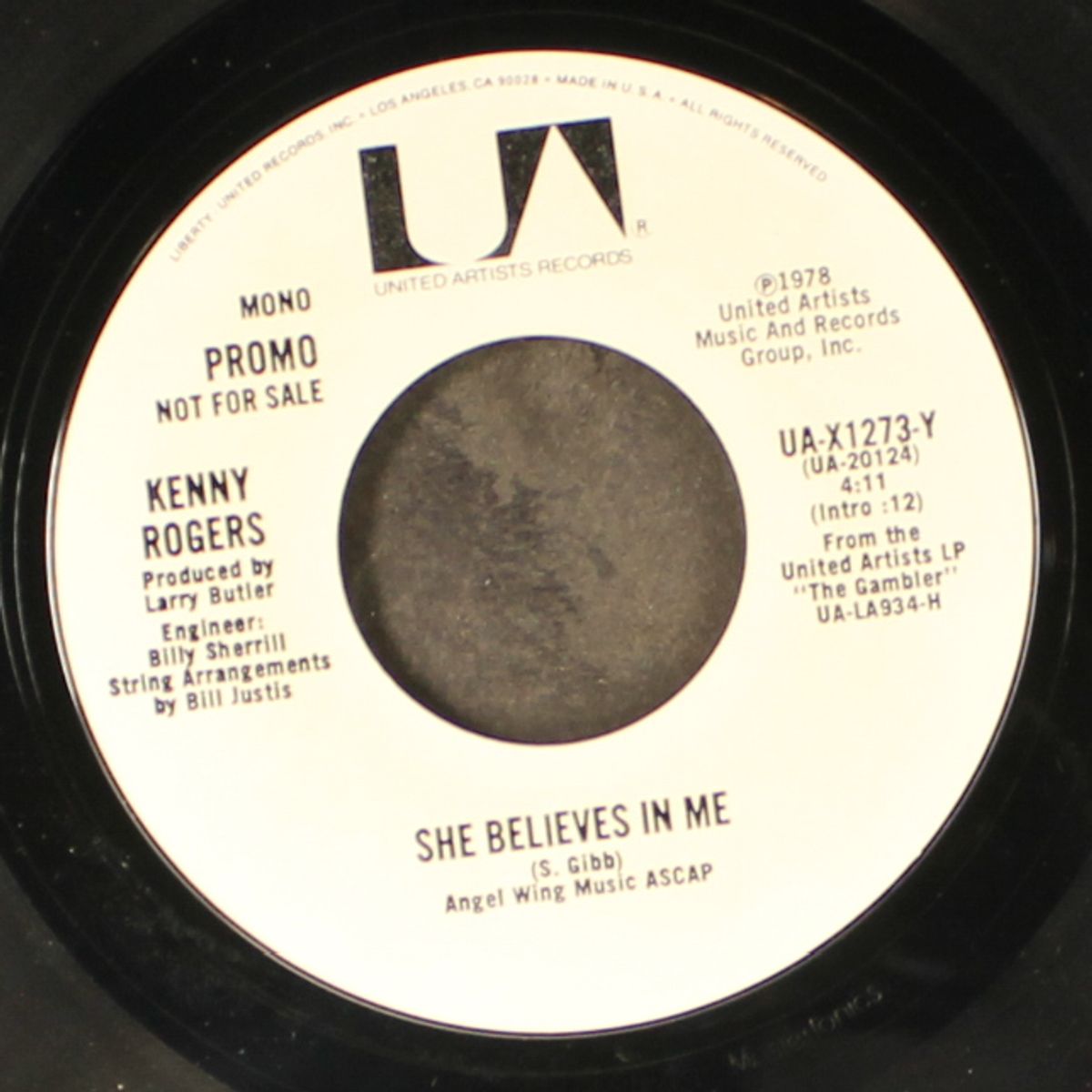 she believes in me / mono by KENNY ROGERS