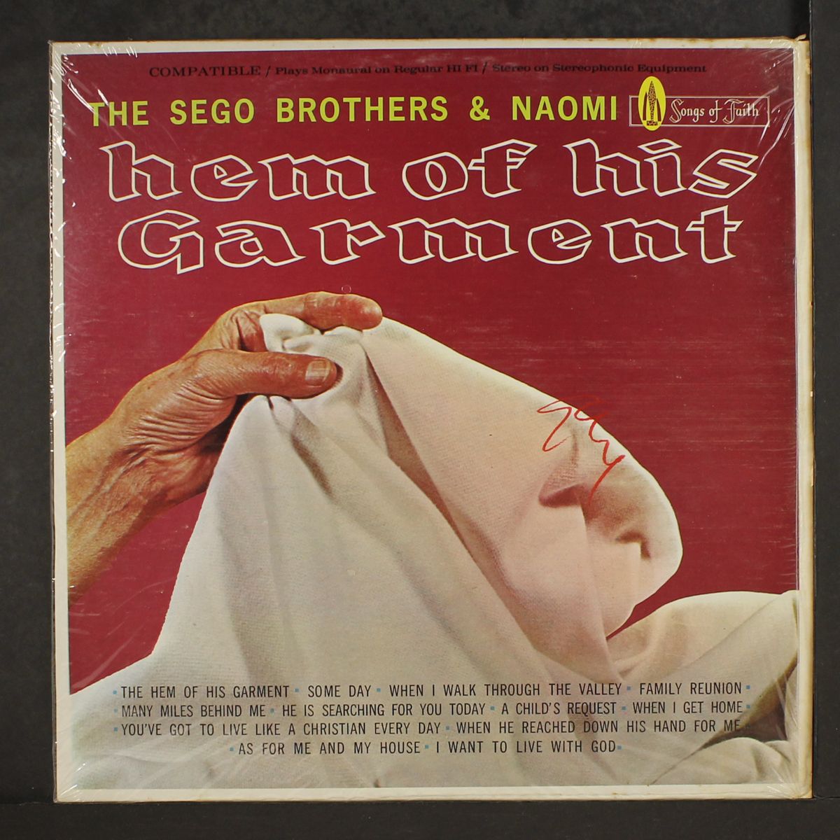 hem of his garment by SEGO BROTHERS & NAOMI