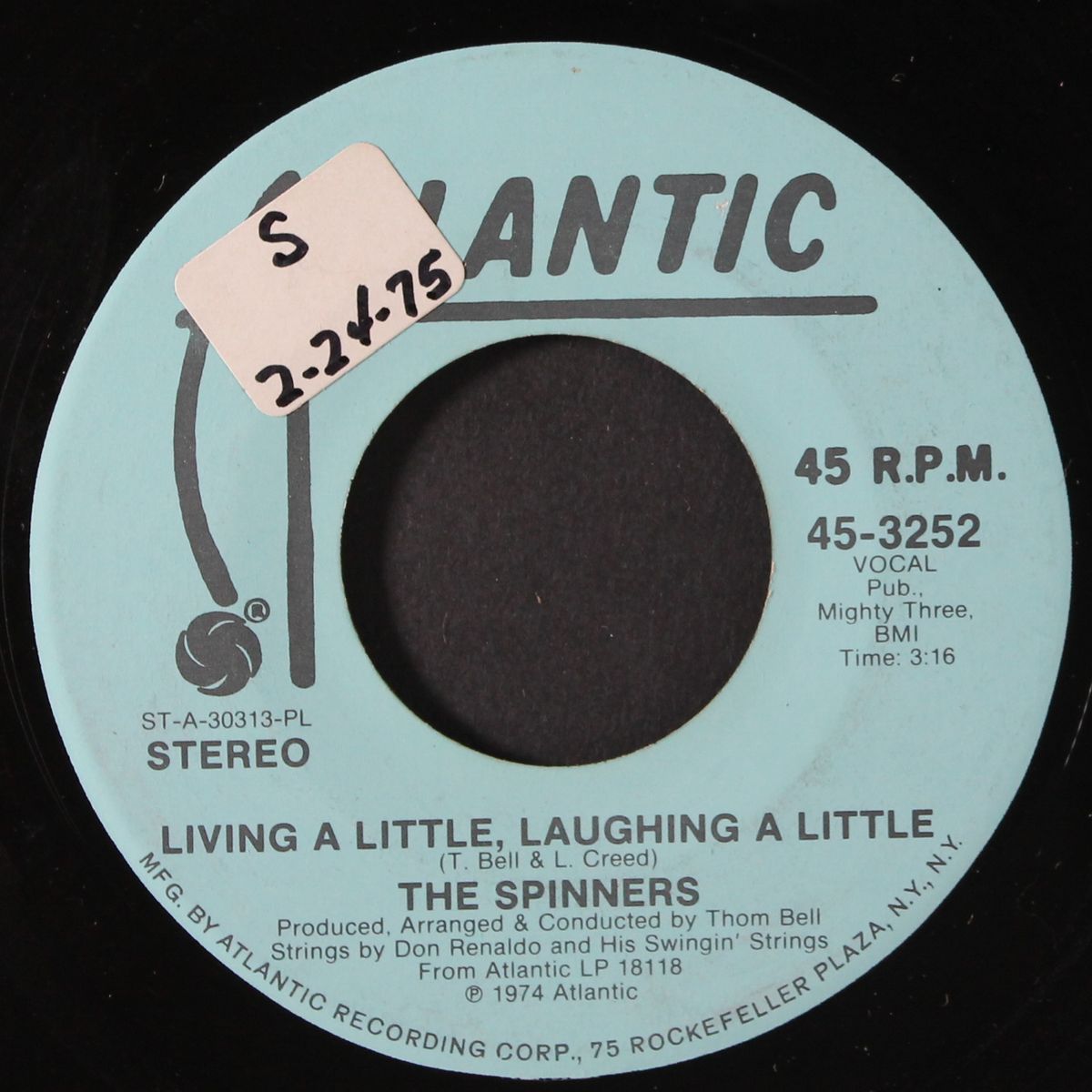 living a little, laughing a little by SPINNERS