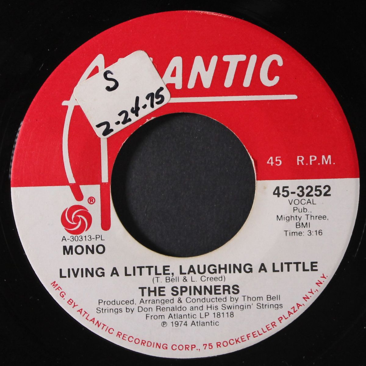 living a little, laughing a little by SPINNERS