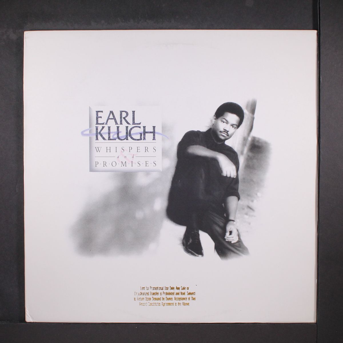 whispers and promises by EARL KLUGH