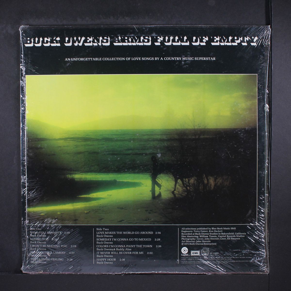 arms full of empty by BUCK OWENS
