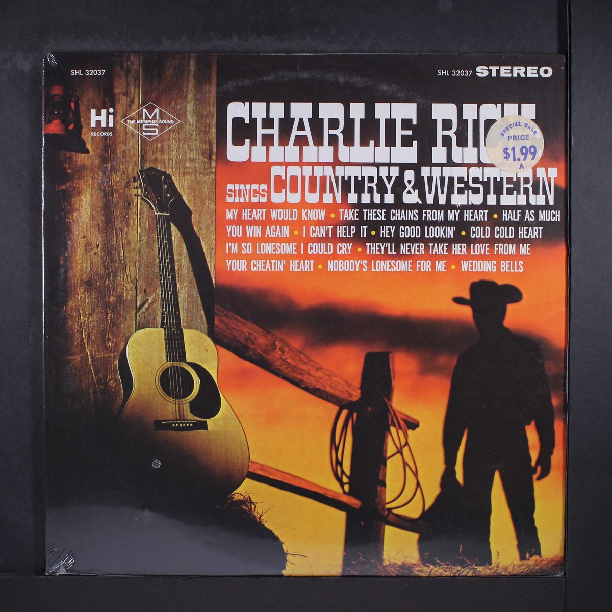 sings country & western by CHARLIE RICH