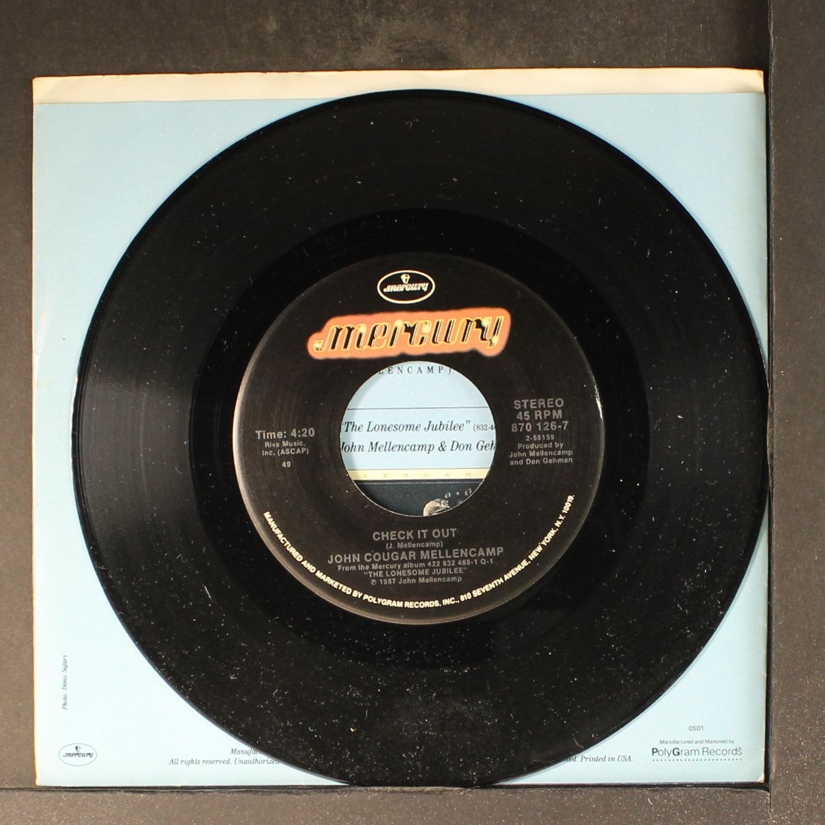 check it out by JOHN COUGAR MELLENCAMP