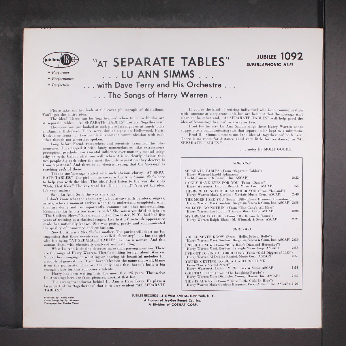at separate tables by LUANN SIMMS