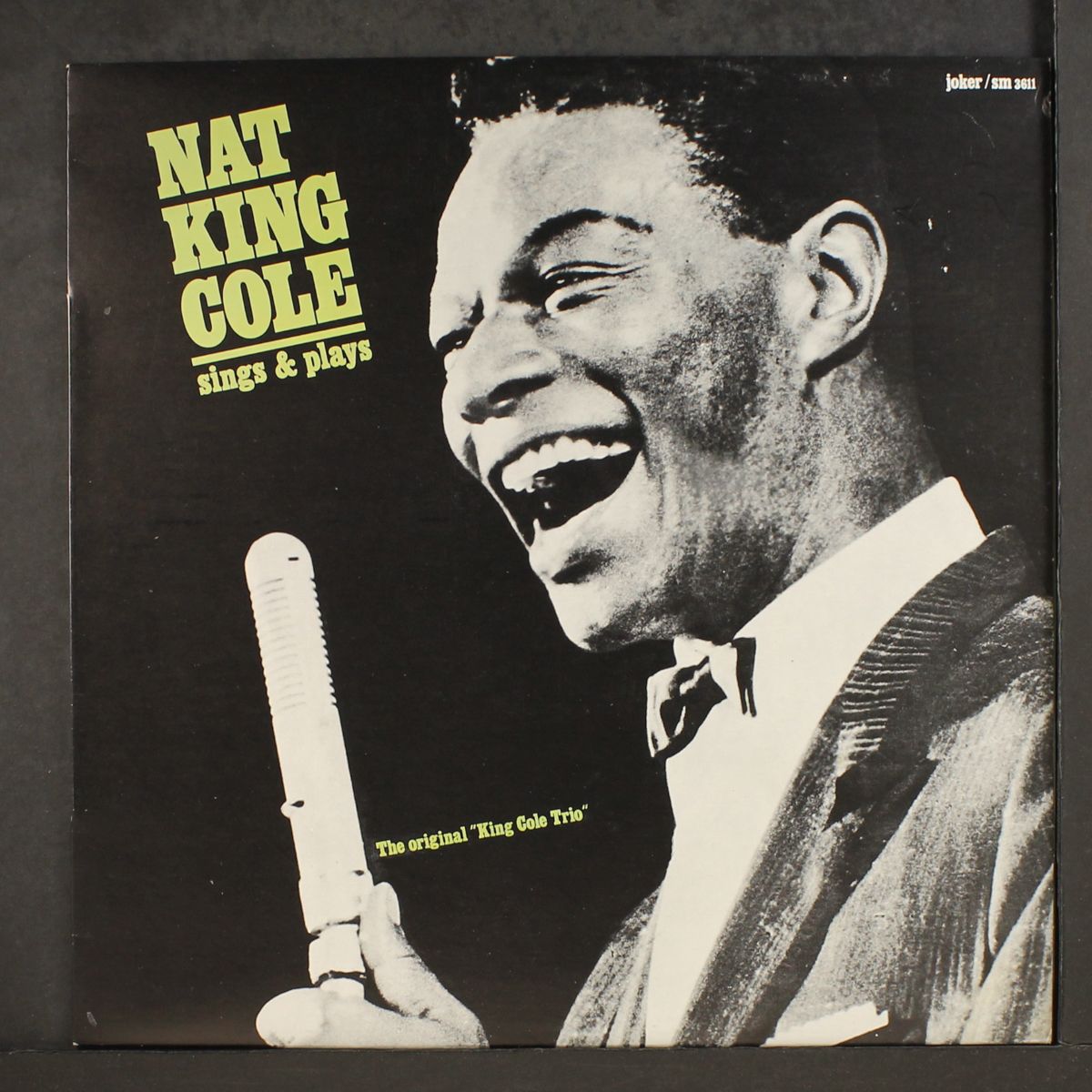 sings & plays by NAT KING COLE