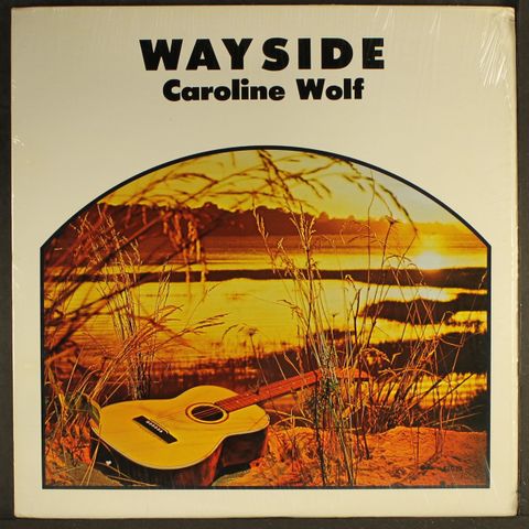 CAROLINE WOLF