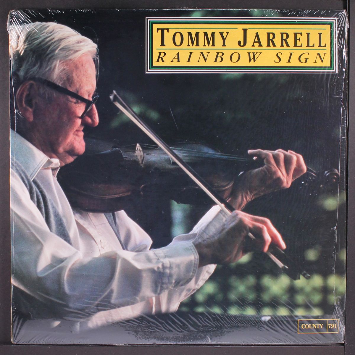rainbow sign by TOMMY JARRELL