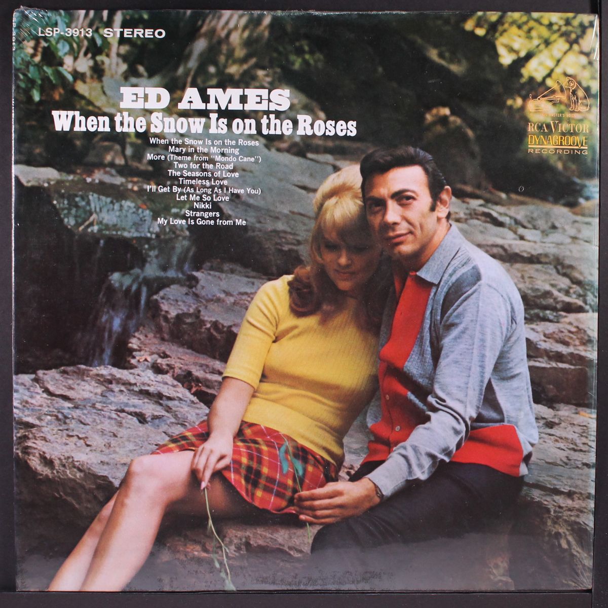 when the snow is on the roses by ED AMES