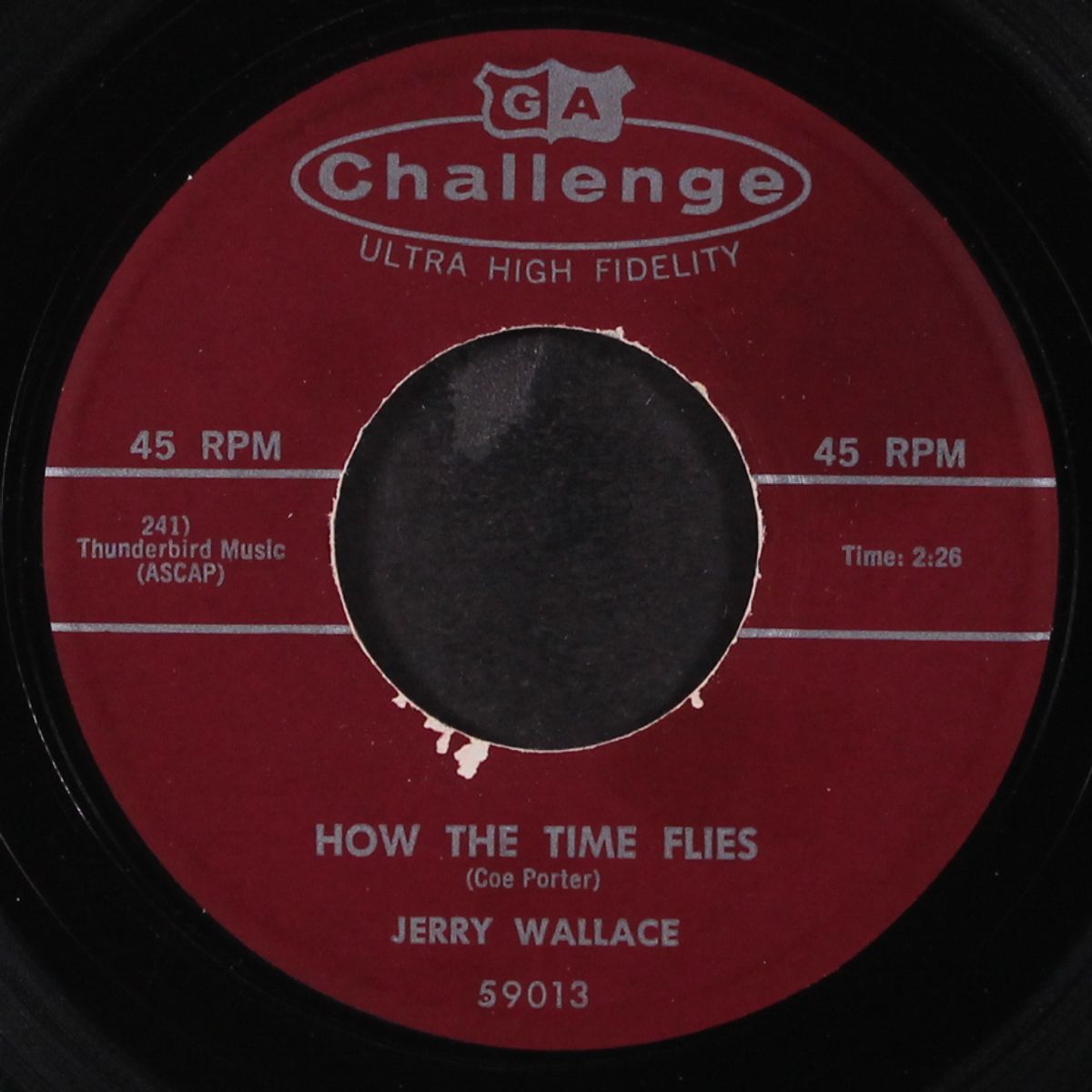 how the time flies / with this ring by JERRY WALLACE