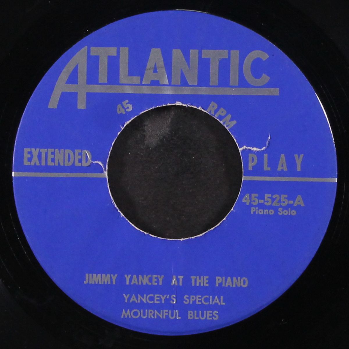 at the piano by JIMMY YANCEY
